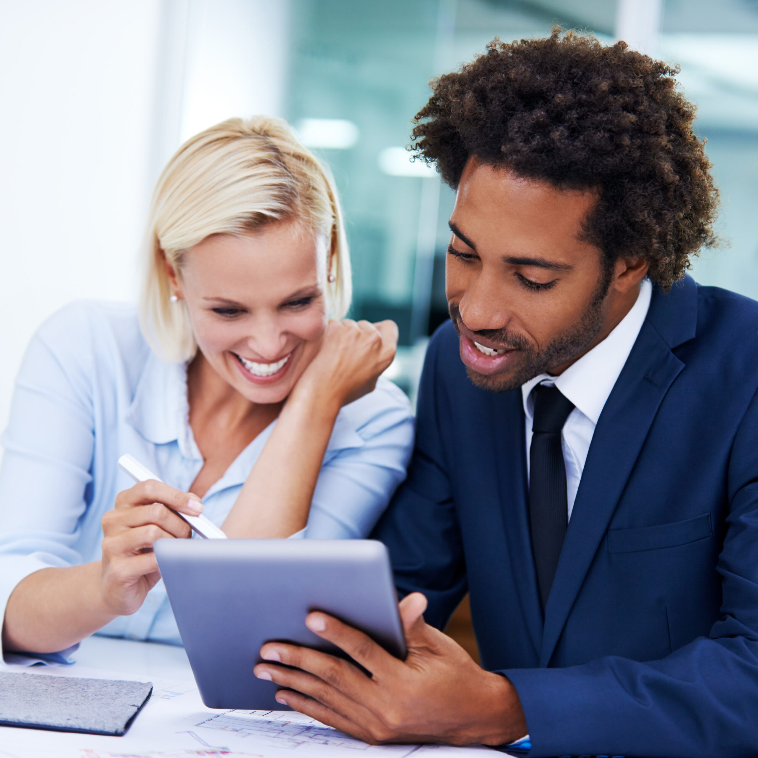 Business Professionals Reviewing Documents Together